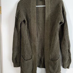 Green knit open front cardigan with pockets